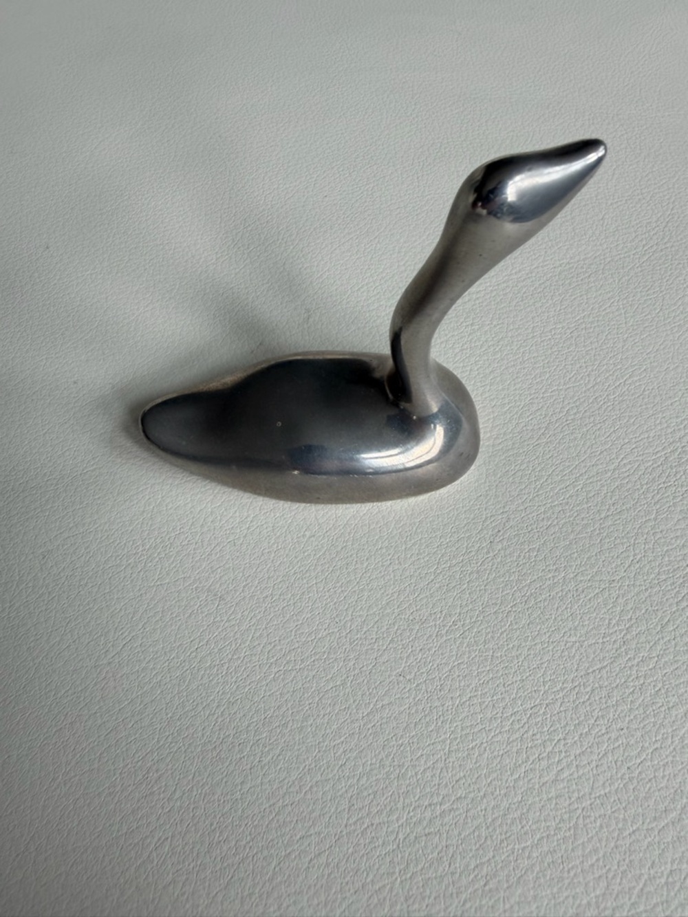 Hoselton Canada Polished Aluminum Floating Goose. 3.5” tall. Excellent shape.